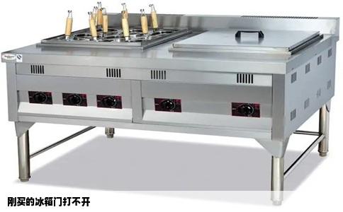 刚买的冰箱门打不开